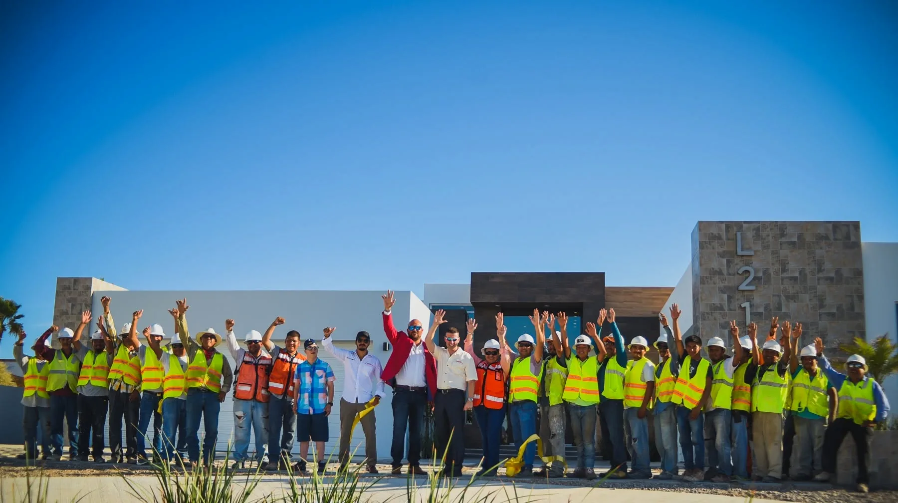 The Rocky Point Home Builders crew celebrating a finished custom home in Puerto Peñasco
